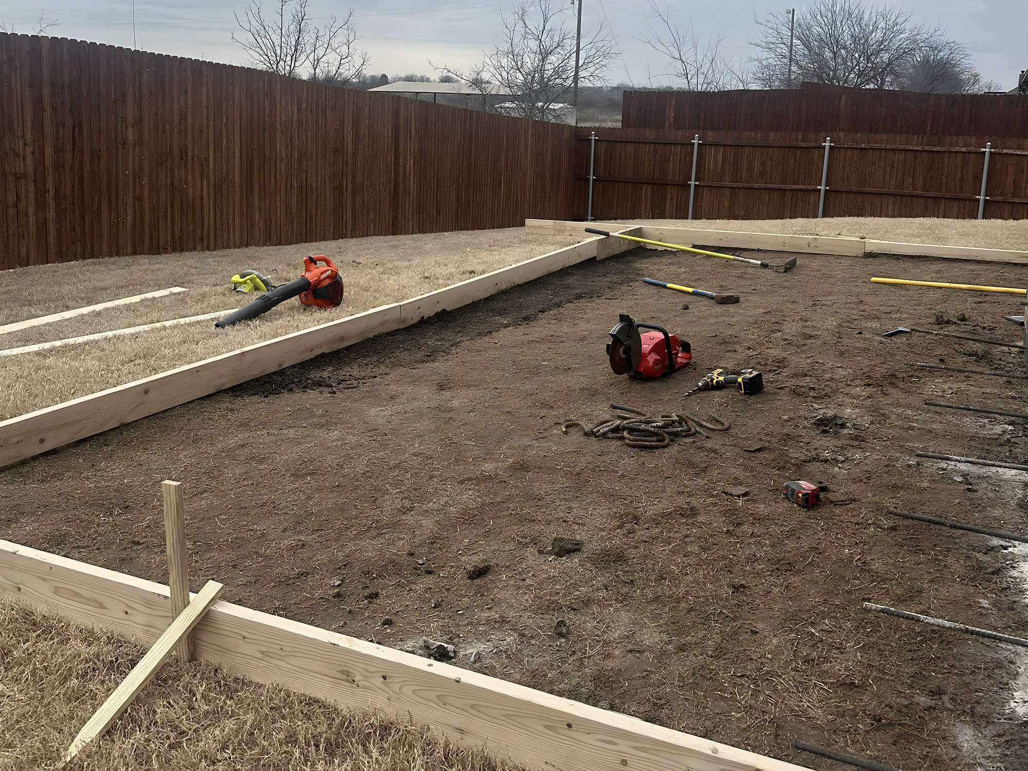 Patio area being prepped and framed out with wooden beams